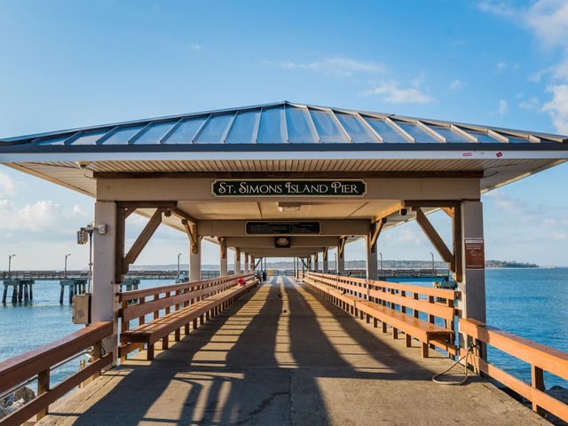 The covered St. Simons Island Pier stretching out over the water